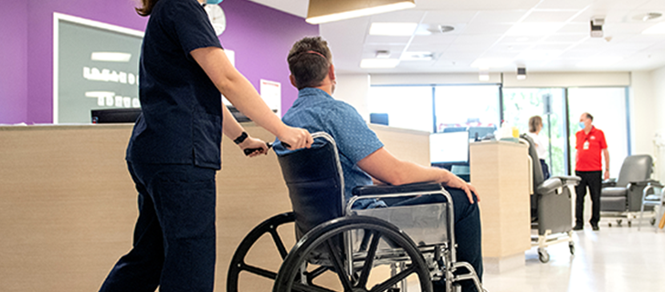Nurse and patient in wheelchair